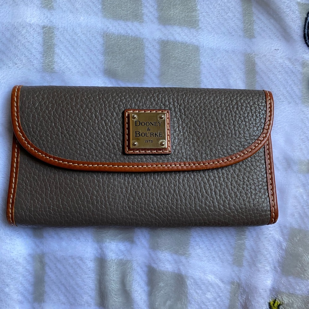 Dooney & Bourke wallet and check book holder.
